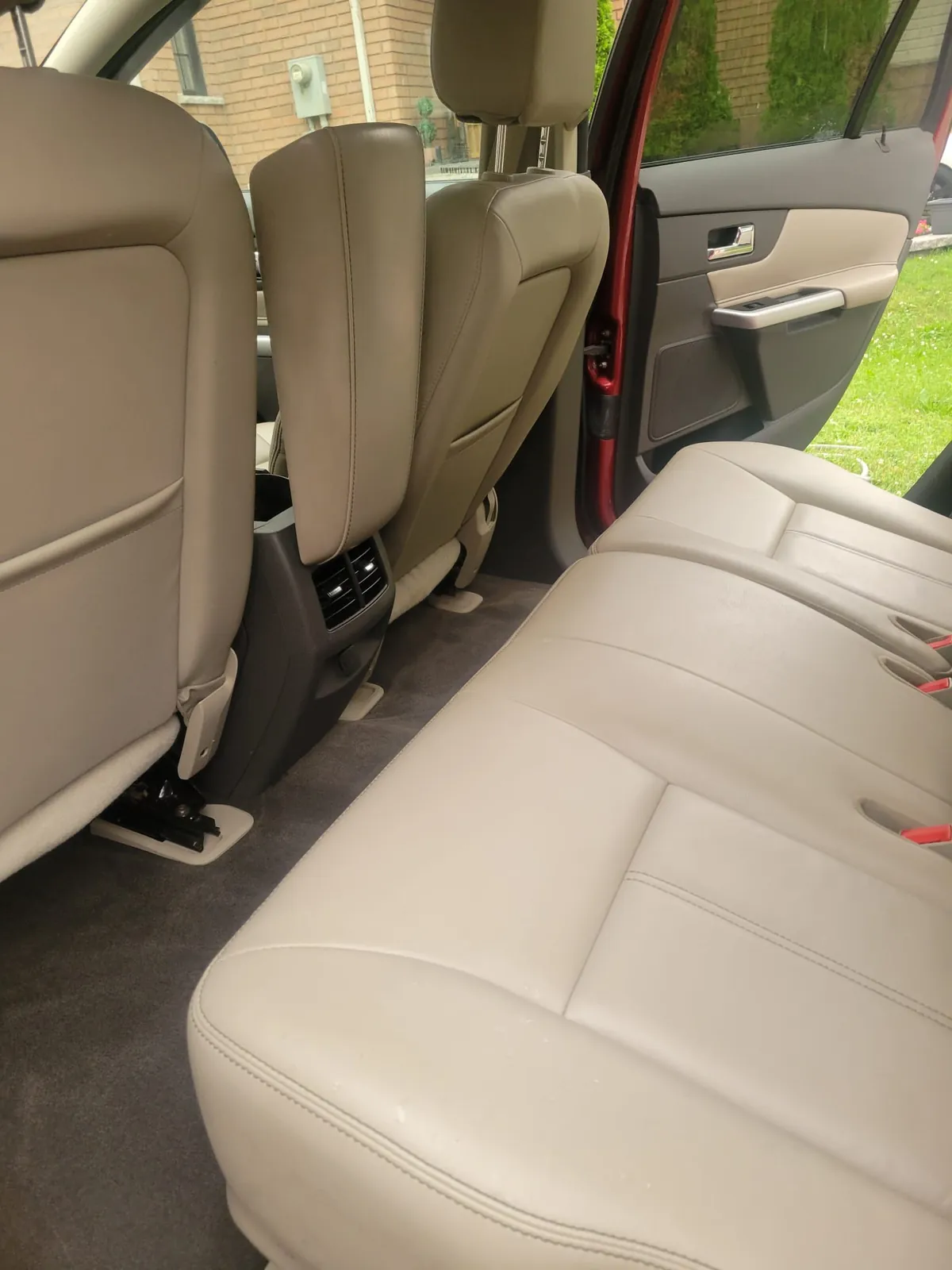 After: Ford Edge cargo area vacuumed and deep cleaned down to clean carpet, Ajax mobile detail
