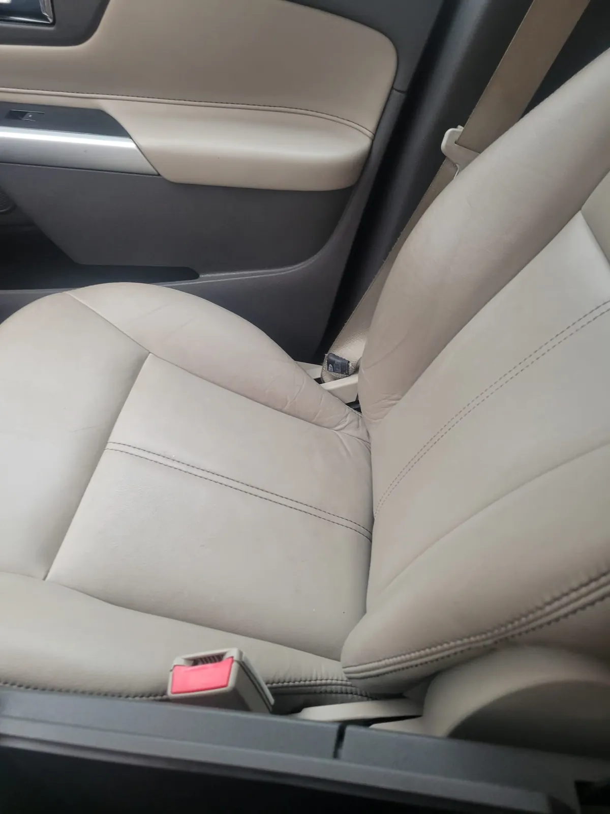 After: Ford Edge footwell with pedals scrubbed clean and carpet salt removed, Ajax