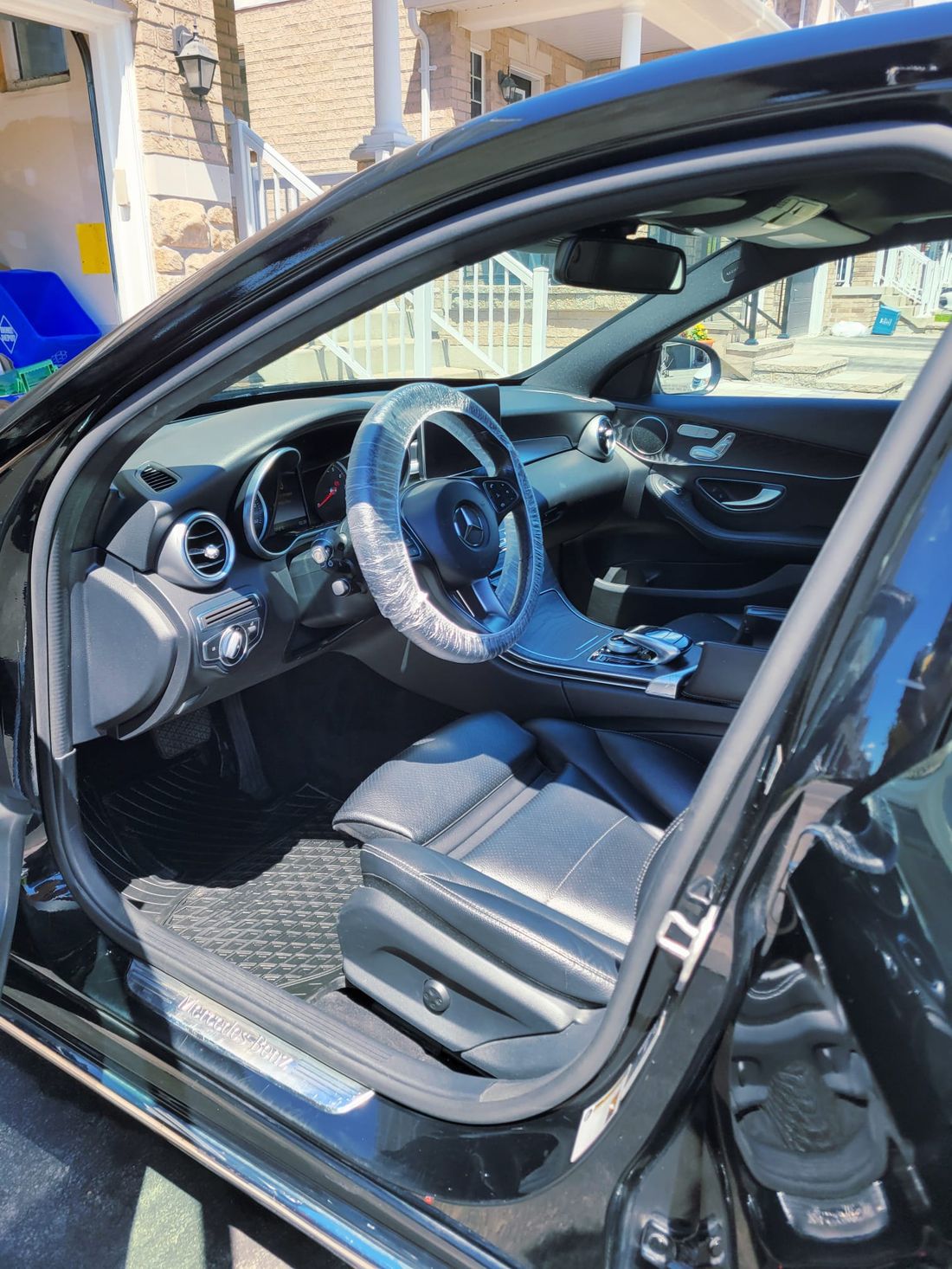 Clean detailed black leather interior of a Mercedes-Benz C-Class